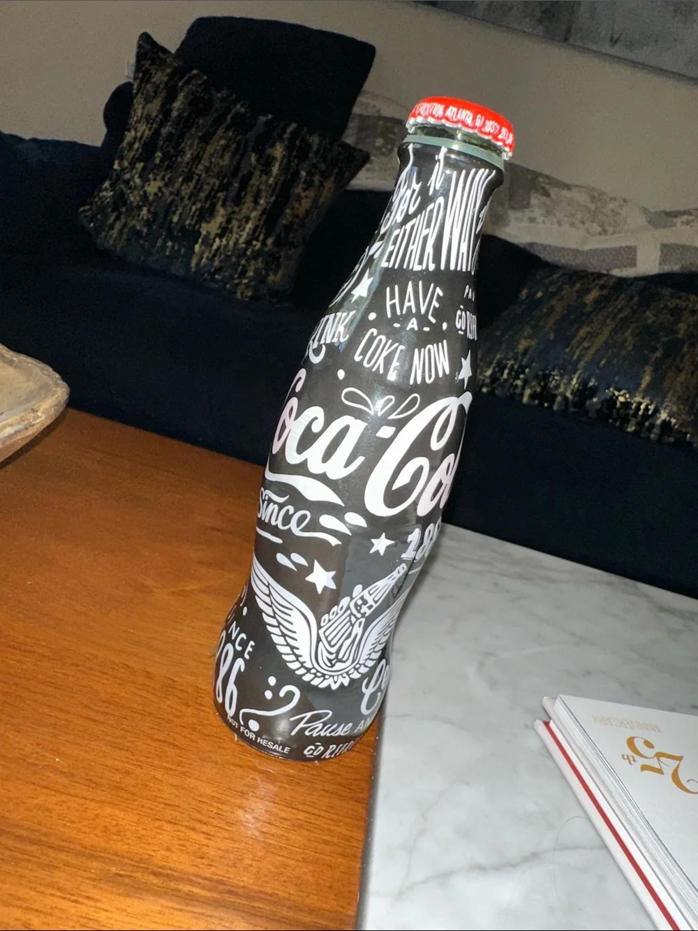 Coca Cola Black Bottle with White Graphic and Red Cap - Picture 1 of 6